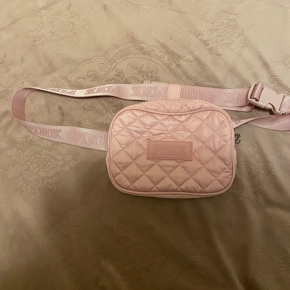 Pink Fanny pack from PINK. Super comfy and great for traveling.